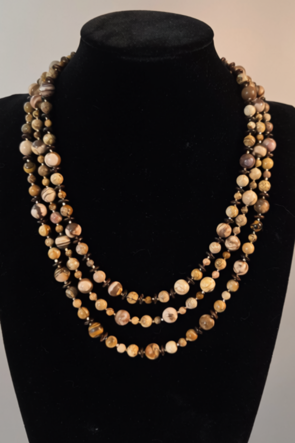 Desert Mosaic Necklace on stand Desert Mosaic Necklace