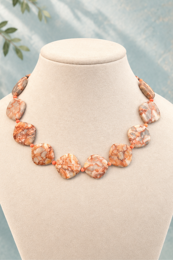 Peach Sunset on stand Peach Sunset Necklace