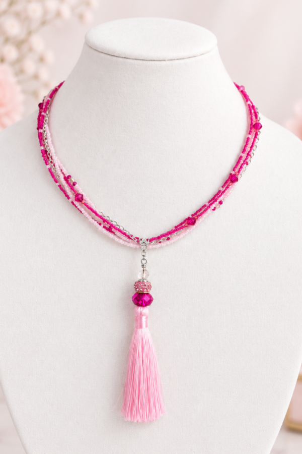 pink tassel on stand Pink Tassel Necklace